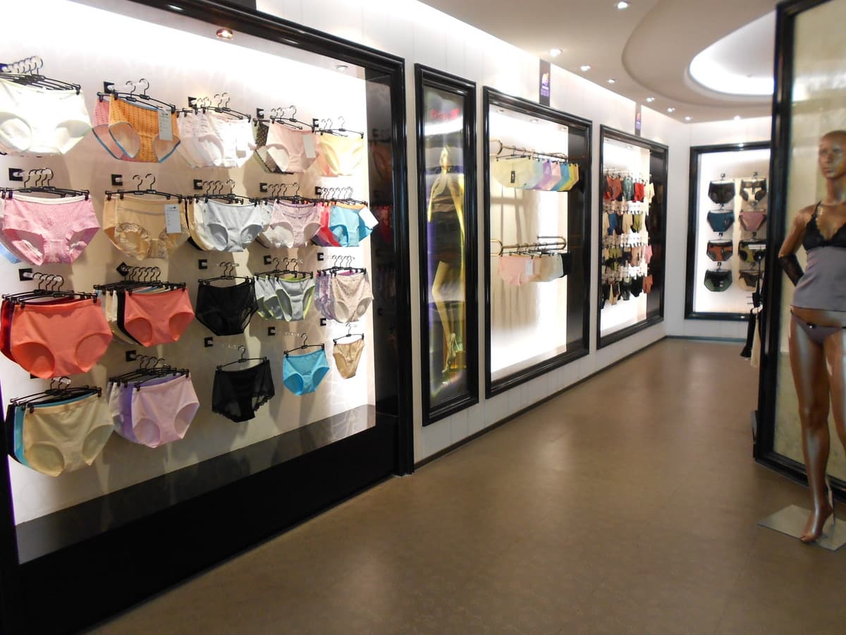 Shapewear displayed on mannequins in the Xinnishi product showroom